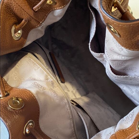 Michael Kors Brown Shoulder Bag with Tassel and Drawstring Accents - Picture 7 of 8